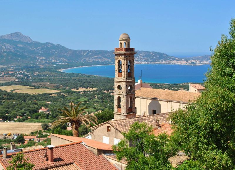 The bell tower of the church of Lumio